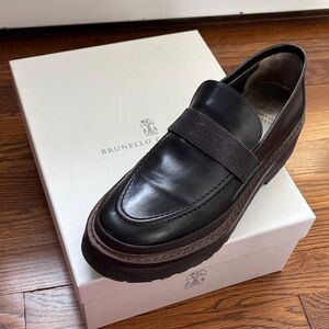 Brunello Cucinelli Women’s Black Lug sole Leather Loafers with Monilli trim